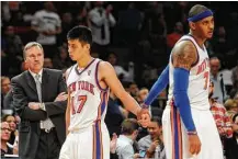  ?? Bill Kostroun / Associated Press ?? The emergence of Jeremy Lin, center, complicate­d the dynamic between Mike D’Antoni and Carmelo Anthony, right, in New York.