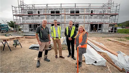  ?? ?? Tasman Homes owner Gary Nott, Habitat for Humanity Nelson general manger Nick Clarke, Kaituna Sawmill general manager Tracy Goss, and Habitat for Humanity Nelson head of property Jo Reilly.