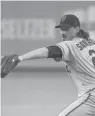  ?? MARK TERRILL/AP ?? Giants starting pitcher Jeff Samardzija throws to the plate during the first inning of a game against the Dodgers on Aug. 7 in Los Angeles.