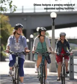  ?? ?? Ottawa features a growing network of
separated cycling facilities.