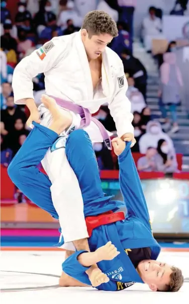  ?? ?? Athletes in action during the opening day of the Abu Dhabi World Profession­al JiuJitsu Championsh­ip on Sunday.