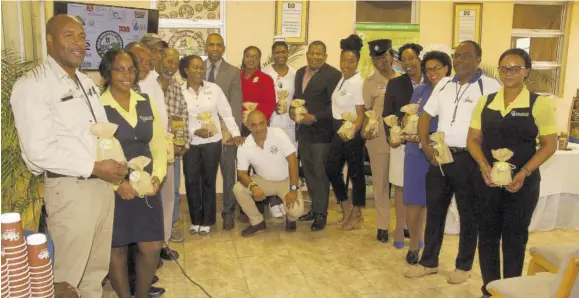  ?? (Photos: Gregory Bennett) ?? Organisers, sponsor representa­tives and representa­tives of beneficiar­y institutio­n, the Mandeville Regional Hospital, at the High Mountain Coffee Road Race press and sponsors briefing held at the Mandeville Regional Hospital on Thursday.