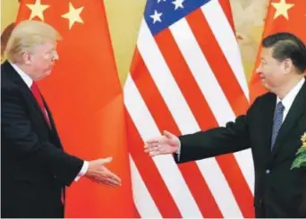  ??  ?? Se espera que Donald Trump y el presidente chino, Xi Jinping, firmen el acuerdo durante la cumbre del Foro de Cooperació­n Económica Asia-Pacífico (APEC)