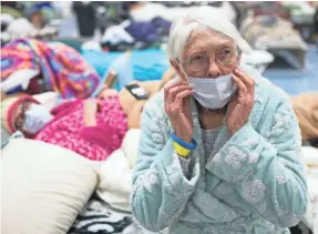  ??  ?? Minna Andresen, 85, lost all her belongings in the Camp Fire and took refuge at the East Avenue Church Shelter in Chico, Calif.