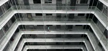 ?? ANTHONY WALLACE/AFP/GETTY IMAGES FILES ?? In Hong Kong, 48 per cent of residents live in government-subsidized housing. In Vancouver, that number is just three per cent.