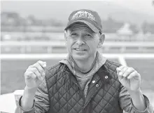  ?? AP Photo/Damian Dovarganes ?? ■ Hall of Fame jockey Mike Smith takes questions about horse Justify on May 24 at the Santa Anita Park in Arcadia, Calif. Mike Smith has ridden some of the best horses in history, Zenyatta and Arrogate come to mind, and is the career leader in...