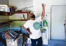  ?? Elizabeth Conley / Staff photograph­er ?? Harvey Forgotten Survivors Caucus member Doris Brown shows damage remaining in her garage from Harvey on Tuesday.