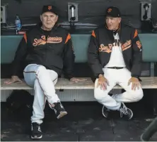  ?? Gabrielle Lurie / The Chronicle 2017 ?? Dave Righetti (right) spent 11 seasons on manager Bruce Bochy’s staff and a total of 18 seasons as pitching coach.