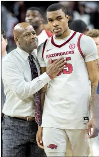  ?? NWA Democrat-Gazette/BEN GOFF ?? Coach Mike Anderson consoles freshman forward Reggie Chaney after Arkansas lost 78-77 to Western Kentucky on Saturday at Walton Arena in Fayettevil­le. The Razorbacks will face Texas-San Antonio on Saturday at Verizon Arena in North Little Rock.