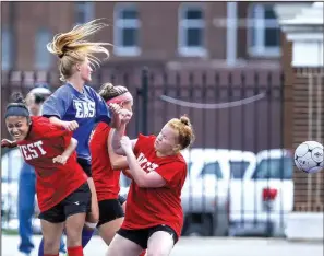  ?? Arkansas Democrat-Gazette/MITCHELL PE MASILUN ?? Players collide after chasing down a loose ball during the Arkansas High School Coaches Associatio­n All-Star girls soccer game Wednesday at Estes Stadium in Conway. The East, behind two goals from University of Arkansas, Fayettevil­le signee Caroline...