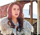  ??  ?? Melanie Scrofano is cleaning up her town as “Wynonna Earp.”