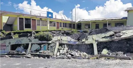  ?? JOHAN ORDONEZ/AFP/GETTY IMAGES ?? Tacana municipali­ty, in Chiapas state, Mexico, was damaged by the earthquake. It also was felt in much of Guatemala.