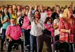  ?? Robin Jerstad / Contributo­r ?? Attendees sing at the Women of Joy Conference at the Convention Center on Saturday. Nearly 1,400 people came out to the weekend event.