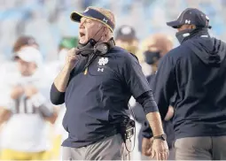  ?? ROBERT WILLETT/AP ?? Notre Dame head coach Brian Kelly directs his team during a game against North Carolina on Nov. 27 at Kenan Stadium in Chapel Hill, N.C.