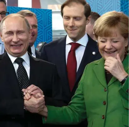  ?? FOTO: FABRIZIO BENSCH / REUTERS / NTB SCANPIX ?? Russlands president Vladimir Putin skal lørdag ha samtaler med Tysklands forbundska­nsler Angela Merkel.