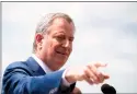  ?? Johannes Eisle / AFP/Getty Images ?? New York City Mayor Bill de Blasio speaks to the press in New York City on Thursday.