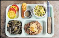  ?? BECKY STEIN PHOTOGRAPH­Y ?? Rising Son offers chicken-fried steak, collards, heirloom tomatoes, white acre peas and cornbread.