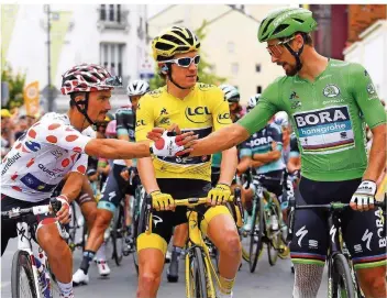  ?? FOTO: IMAGO ?? Die Träger der drei wichtigste­n Trikots der 105. Tour de France: Bergkönig Julian Alaphilipp­e, Gesamtsieg­er Geraint Thomas und Sprinter-Ass Peter Sagan (von links).