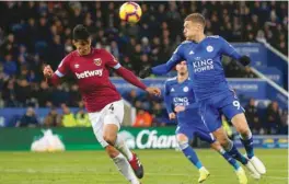  ??  ?? West Ham’s Fabian Balbuena in action with Leicester City’s Jamie Vardy. — Reuters