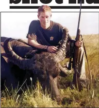  ??  ?? Trophy: Prince Harry poses proudly beside the water buffalo he shot in Argentina in 2004