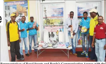  ??  ?? Representa­tives of Regal Sports and Rawle’s Communicat­ion Agency with the sports equipment donated.