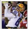  ?? (AP/Matthew Hinton) ?? LSU tight end Jack Bech caught a 29-yard touchdown pass from Garrett Nussmeier in the second quarter to give the Tigers at 10-3 lead.