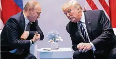  ?? FOTO: DPA ?? Wladimir Putin (l.) und Donald Trump beim G20-Gipfel in Hamburg.