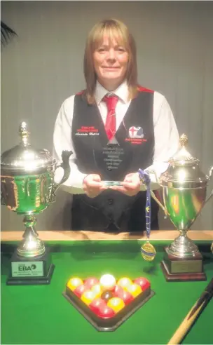  ??  ?? ●● Amanda Watson, the new Rossendale Snooker League singles champion (left), and pictured with her World, European and Home Nations 8-ball pool trophies (above)