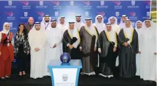  ?? — KUNA ?? KUWAIT: His Highness the Prime Minister Sheikh Jaber Al-Mubarak Al-Hamad Al-Sabah poses for a group photo with officials during the opening of the new bowling club.