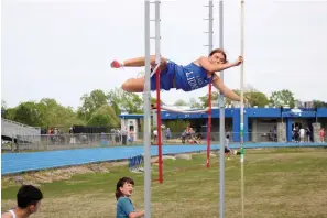  ?? The Sentinel-Record/James Leigh ?? ■ Jessievill­e’s Lavinia Gossow clears the bar at 7 feet during the pole vault at the 3A-5 conference track meet Thursday at Jessievill­e. Gossow won the event with a personal best clearance at 7-6.