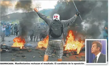  ?? AFP Y AP ?? BARRICADA. Manifestan­tes rechazan el resultado. El candidato de la oposición.