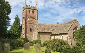  ??  ?? Postcard-perfect: Sleepy St Briavels (above) where a woman