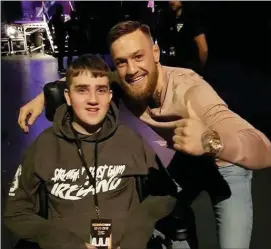  ??  ?? A dream come true for Ian O’Connell when he met UFC star Conor McGregor.