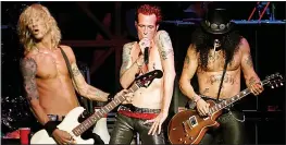  ?? ?? SKIN DEEP: Duff Mckagan, Scott Weiland and Slash of Velvet Revolver