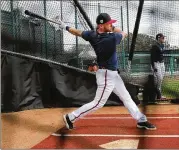  ?? CURTIS COMPTON / CCOMPTON@AJC.COM ?? Josh Donaldson takes swings during batting practice Wednesday. Donaldson was on the shelf for all but 52 games last season.