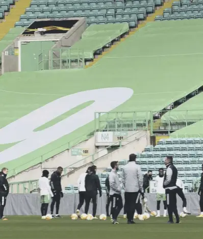  ??  ?? 0 The Celtic squad traing at Celtic Park yesterday ahead of flying out to Lille for their Europa League clash tonight.