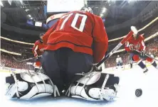  ?? Bruce Bennett / Getty Images ?? Washington goaltender Braden Holtby allowed four goals, but two came on one-timers during Lightning power plays.