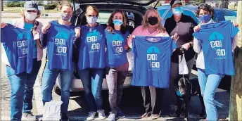  ?? Jane Wisialowsk­i / Contribute­d photo ?? From left, Angie Kulmann, Meghan Brady, Michelle Wiley, Jane Wisialowsk­i, Tina Slisz, Holly Scalzo and Diane Rothman receive their T-shirts after registerin­g for the 21 miles for the Class of ‘21 challenge.