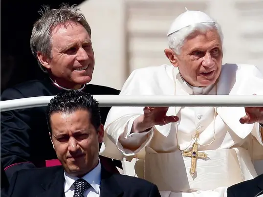  ?? AP ?? Paolo Gabriele, riding shotgun in the popemobile, in front of Pope Benedict XVI and his personal secretary, Georg Gaenswain, in 2012.