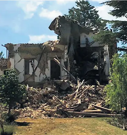  ??  ?? Destroyed: left and far left, the ruins of the HennikerGo­tleys’ villa in the hamlet of Sommati. The area was hit by an earthquake at 3.36 in the morning