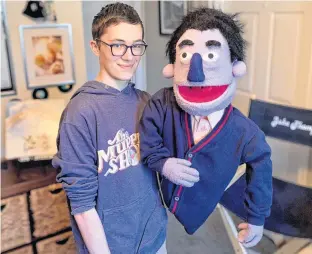  ?? ANDREW WATERMAN • THE TELEGRAM ?? Jake Thompson with puppet and retired TV personalit­y, Gary Wheeseltin. Thompson has been fascinated by “The Muppet Show” since he was a child and began making his own puppets as he got older, eventually creating characters and his own Youtube channel. His new show “The Adventures of Gary and Lou,” written by Jake and Pete Soucy, is tentativel­y scheduled to air on Bell's Fibetv1 this fall.