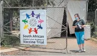  ?? JEROME DELAY
TORSTAR FILE PHOTO ?? A researcher walks out of a COVID-19 vaccine trial facility outside Johannesbu­rg, South Africa. Diksha Joshi argues we will only beat the pandemic through a united, global effort.