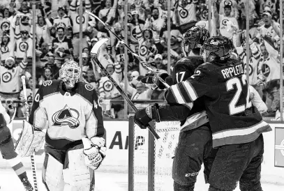  ?? USA TODAY SPORTS ?? Winnipeg Jets centre Mason Appleton celebrates a second-period goal on April 21 by Adam Lowry, left, on Colorado Avalanche goaltender Alexandar Georgiev in Game 1 of the first round of the 2024 Stanley Cup playoffs at Canada Life Centre.