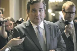  ?? ALEX WONG — GETTY IMAGES ?? Sen. Ted Cruz, R-Texas, discusses details of the new health care bill released Thursday. Cruz added an amendment to the plan that would allow insurers to offer bare-bones policies with lower premiums as long as they also offered comprehens­ive polices.