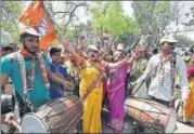  ?? SUSHIL KUMAR/HT FILE ?? BJP workers celebrate as candidates file their nomination­s for MCD elections in New Delhi.