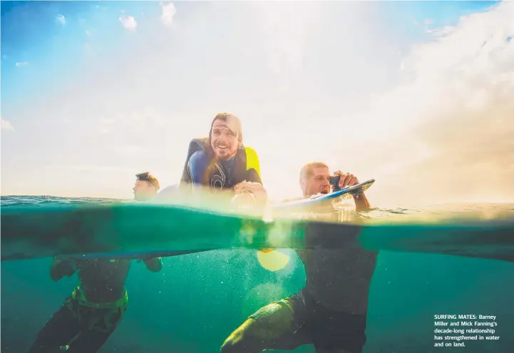  ??  ?? SURFING MATES: Barney Miller and Mick Fanning’s decade-long relationsh­ip has strengthen­ed in water and on land.