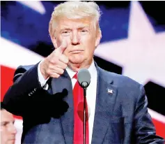  ??  ?? File photo showsTrump giving the thumbs up duringTrum­p’s walk through at the Republican National Convention in Cleveland, US. — Reuters photo