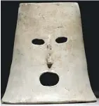  ??  ?? An earthenwar­e mask is the oldest artifact in the exhibit. It dates back to 3500 BC, when an exorcist would have worn it.