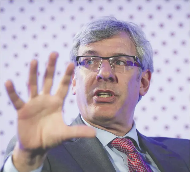  ?? KEVIN VAN PAASSEN / BLOOMBERG FILES ?? Royal Bank of Canada chief executive Dave Mckay says Canadian banks are repricing roughly 15 per cent of their “back book”
of existing mortgage clients, a fairly significan­t shock that is pulling disposable income back from the consumer.