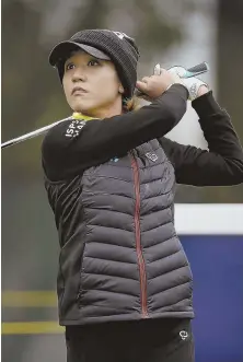  ?? AP PHOTO ?? FOLLOW THE LEADER: Lydia Ko watches her drive from the 16th tee during the first round of the LPGA Mediheal Championsh­ip yesterday in Daly City, Calif.